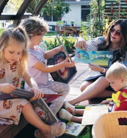 Preschoolers reading together